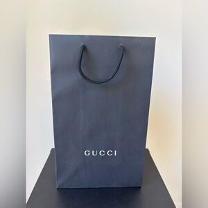 Black Gucci gift bag